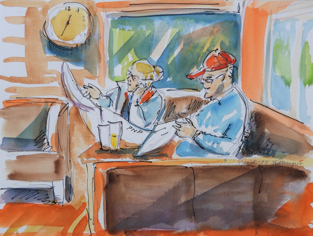 Im Café - Gäste mit Zeitung im Café