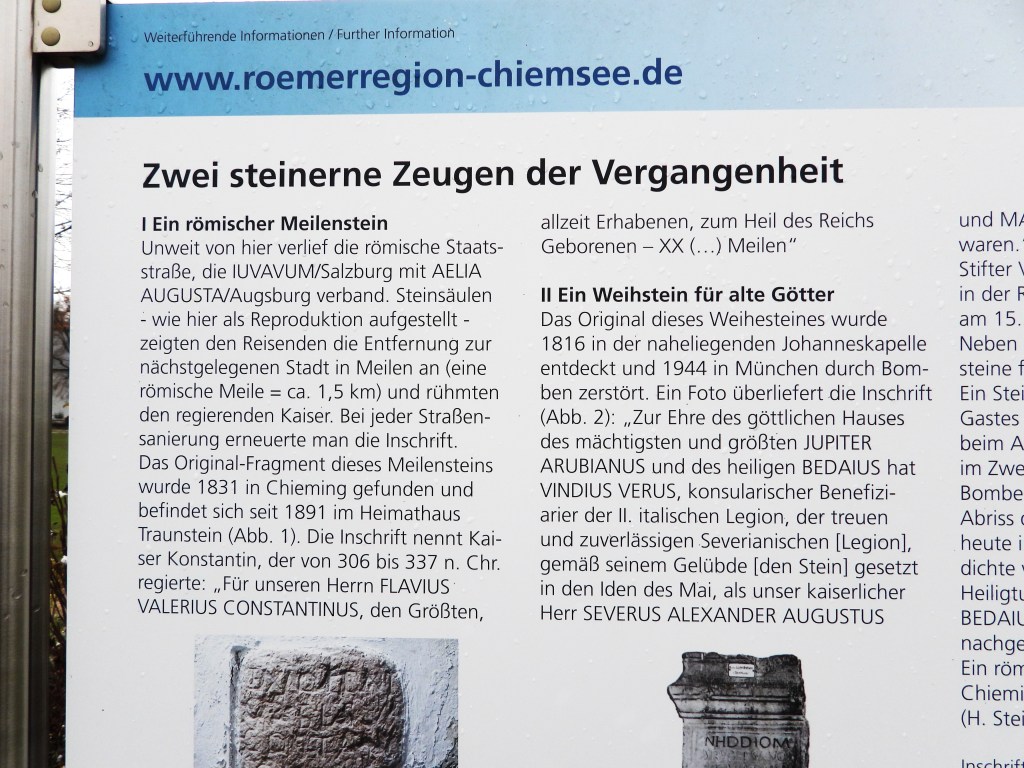Information panel about two ancient Roman milestones, detailing their historical significance and inscriptions related to Roman history in the Chiemsee region.